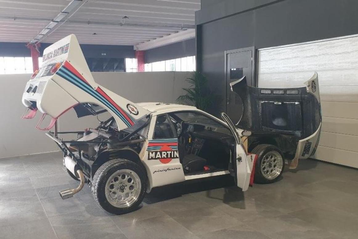 White Lancia Stratos inside a UK car storage company.